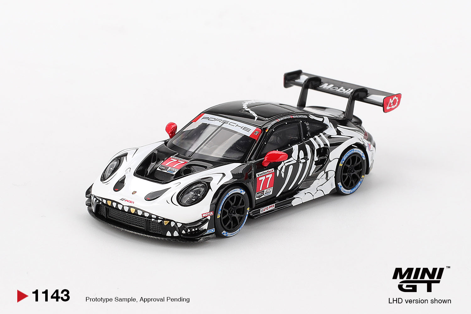 Mini GT 1:64 Porsche 911 GT3 R #77 AO Racing "Skeleton Rexy" IMSA 2025 Petit Le Mans